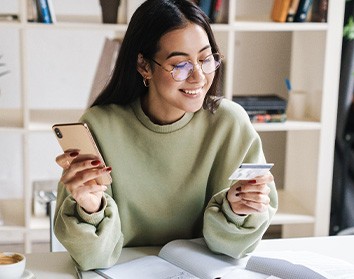 Woman holding a credit card