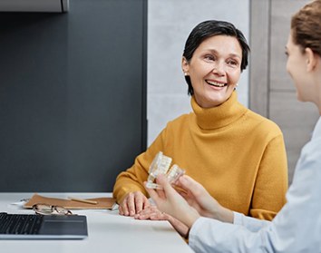 Dentures patient in Morgan Hill talking to dentist