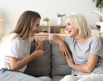 Ladies converse on couch