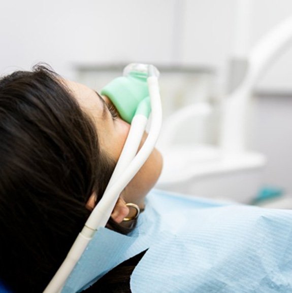Woman relaxing with nitrous oxide sedation
