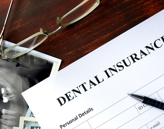 dental insurance form on table