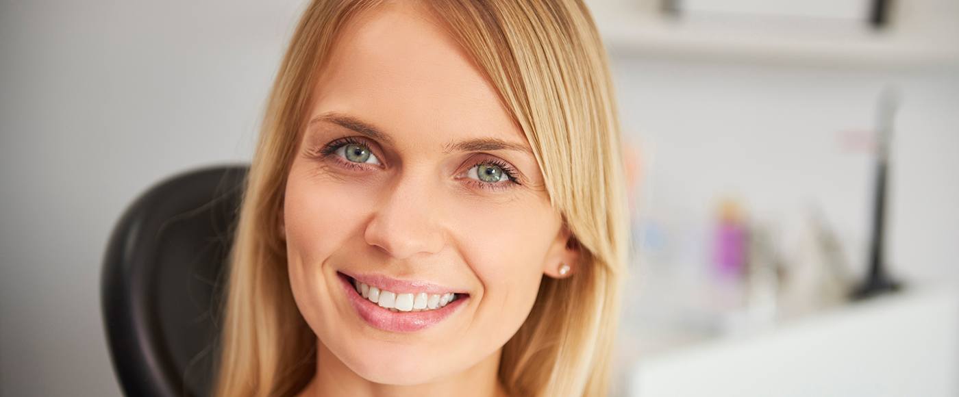 Smiling middle-aged dental patient